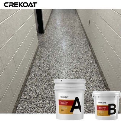 De kleurrijke Vloer die van de Vlokken Epoxyhars Marmeren Granietverschijning voor Garage met een laag bedekt